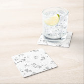 een zwart-wit foto van bubbels op een witte achter kartonnen onderzetters (Insitu)