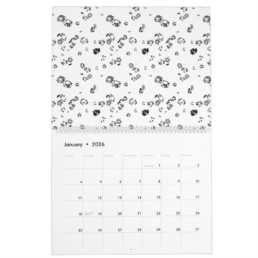Een zwart-wit foto van bubbels op een witte rug kalender (Jan 2026)