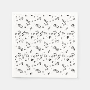 Een zwart-wit foto van bubbels op een witte rug servet