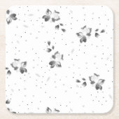 een zwart-wit foto van een aantal stippen kartonnen onderzetters (Voorkant)