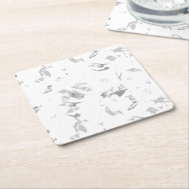 een zwart-wit foto van een witte achtergrond kartonnen onderzetters