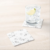 Een zwart-wit foto van sneeuwvlokken kartonnen onderzetters (Insitu)