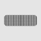 Een zwart-witte achtergrond met veel stippen naamplaatje (Voorkant)