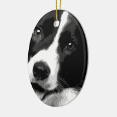 Een zwarte en witte rand collie keramisch ornament (Links)