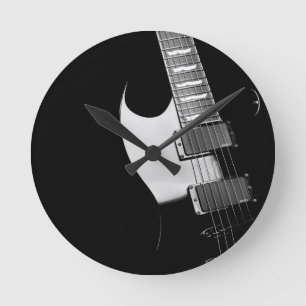 Een zwarte gitaar ronde klok