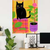 Een zwarte kat met kamerplanten geruite stoel poster (Thuiskantoor)