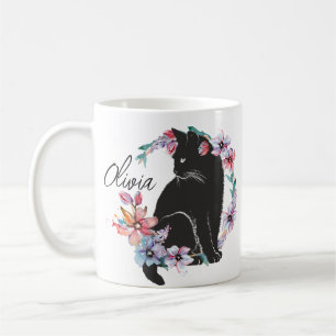 Een zwarte kat omringd door bloemen koffiemok