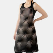 Een zwarte lederen kussenachtergrond, vanaf een au schort (Insitu)