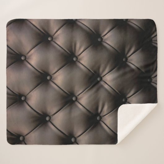 Een zwarte lederen kussenachtergrond, vanaf een au sherpa deken (Voorkant (horizontaal))
