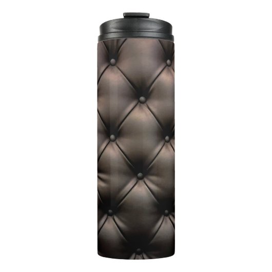 Een zwarte lederen kussenachtergrond, vanaf een au thermosbeker (Voorkant)