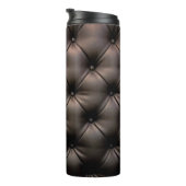 Een zwarte lederen kussenachtergrond, vanaf een au thermosbeker (Geroteerd rechts)