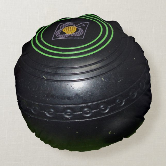 Een zwarte wandelbal, rond kussen (Achterkant)