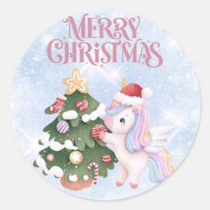 Eenhoorn en kerstboom op sprankelende blauwe lucht ronde sticker