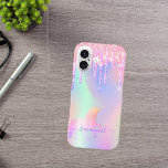 Eenhoorn roze druppels holografische naam iPhone 16 hoesje<br><div class="desc">Een trendy iriserende achtergrond met eenhoorn- en regenboogpastelkleuren in roze, paarse, mintgroen. Versierd met faux glitter druppels in roze, paarse en een regenboogkleurige eenhoorn. Paarse letters. Personaliseer en voeg jouw namen toe. De naam is geschreven met een modern handgeschreven stijlscript met swashes. Als u de swashes alleen wilt laten verwijderen,...</div>