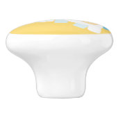 Eenhoorn speelt op het strand keramische knop (Zijkant)