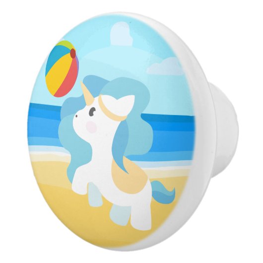 Eenhoorn speelt op het strand keramische knop (Rechts)