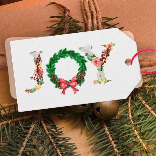 Eenvoudig elegant bloemig kerstkrans vreugdescript cadeaulabel