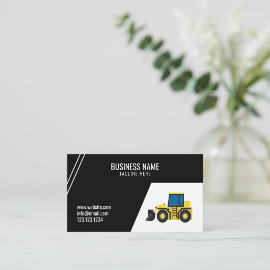 Eenvoudig gebouw met zwarte constructietorder visitekaartje (Staand voorkant)