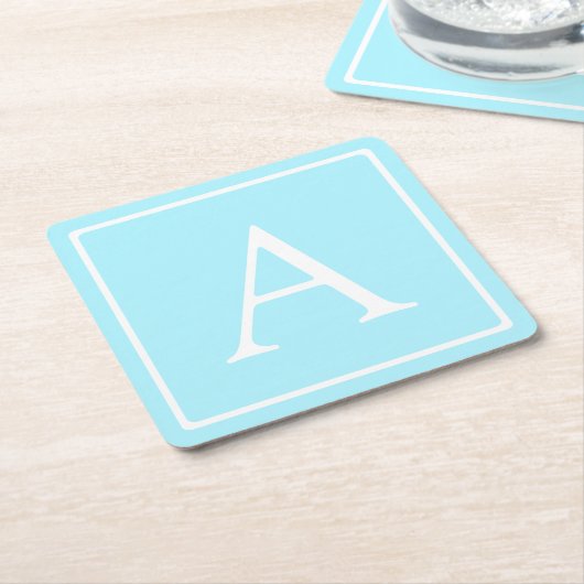 Eenvoudig lichtblauw monogram kartonnen onderzetters (Schuin)