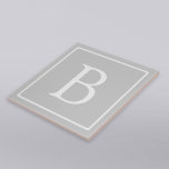 Eenvoudig lichtgrijs monogram tegeltje<br><div class="desc">Bedankt voor je aankoop!</div>