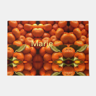 Eenvoudig oranje fruit voegt een naam toe die de m deurmat