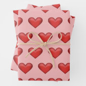 Eenvoudig rood hartpatroon op zwarte roze achtergr inpakpapier vel (In situ)