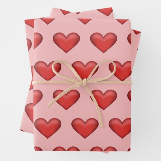Eenvoudig rood hartpatroon op zwarte roze achtergr inpakpapier vel (In situ)