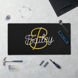 Eenvoudig zwart en goud retroscript monogram bureaumat