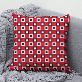 Eenvoudig zwart-wit geometrisch patroon op rood kussen