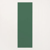 Eenvoudige botanische groene palmbladeren op groen yogamat (Achterkant)