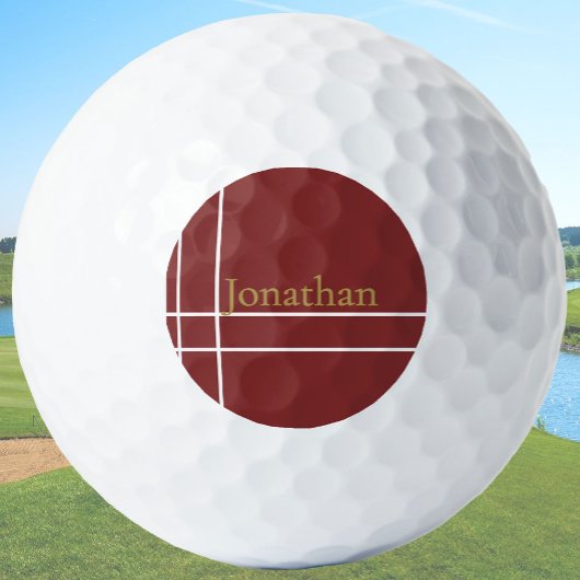 Eenvoudige donkerrode en gouden minimalistische aa golfballen