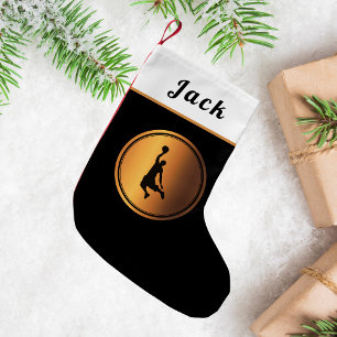 Eenvoudige en elegante gouden basketbalspeler zijn kleine kerstsok