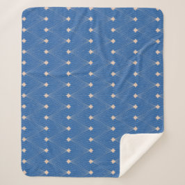Eenvoudige en elegante kerstboom blauw en wit sherpa deken