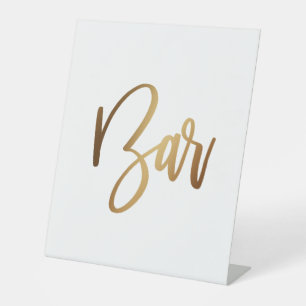 Eenvoudige Gold Handwrite Typografie Bar Reclamebord Met Voetstuk