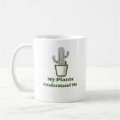 Eenvoudige groene cactussen in potten koffiemok (Links)