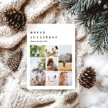 Eenvoudige minimalistische kerst familie foto coll feestdagenkaart<br><div class="desc">Deze eenvoudige en moderne familiefoto collage Merry Christmas briefkaart beschikt over een plek voor u om uw namen toe te voegen, en een bericht op de achterkant in prachtige typemachinetypografie, evenals ruimte voor u om uw eigen fotomontage toe te voegen (met ruimte voor zeven foto's). De perfecte minimalistische kerstvakantie kaart...</div>