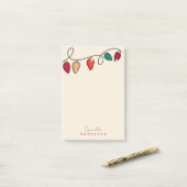 Eenvoudige minimalistische kerstverlichting in de  post-it® notes (Op bureau)