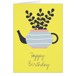 Eenvoudige moderne theepot met plant pastel