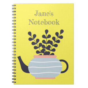 Eenvoudige moderne theepot met plant pastel notitieboek