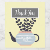 Eenvoudige moderne theepot met plant pastel wijn etiket (Enkel label)