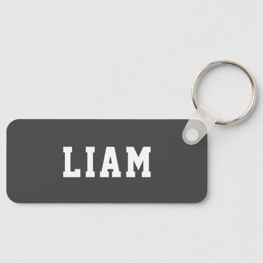 Eenvoudige, persoonlijke grijze rugzak sleutelhanger (Voorkant)