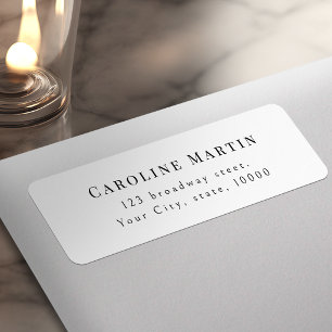 Eenvoudige sierlijke script typografie retouradres etiket