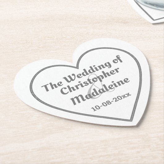 Eenvoudige zilveren grijze lettering op een papier kartonnen onderzetters (Gekanteld)