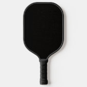 Eenvoudige zwarte achtergrond met een licht patroo pickleball paddle (Voorkant)