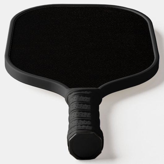 Eenvoudige zwarte achtergrond met een licht patroo pickleball paddle (Laagn)