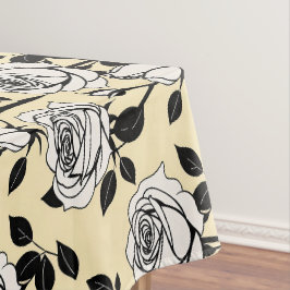 Eenvoudige zwarte en witte rozen in een grafische tafelkleed