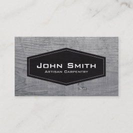Eenvoudige zwarte plaat op houttimmerman visitekaartje