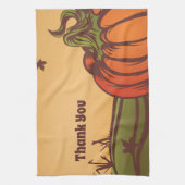 Eenzame pompoen op het veld. De herfst verlaat her Theedoek (Verticaal)