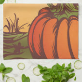 Eenzame pompoen op het veld. De herfst verlaat her Theedoek (Gevouwen)