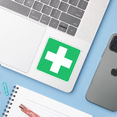 Eerste hulp symbool stickers, wit kruis op groen sticker (Laptop met iPhone)